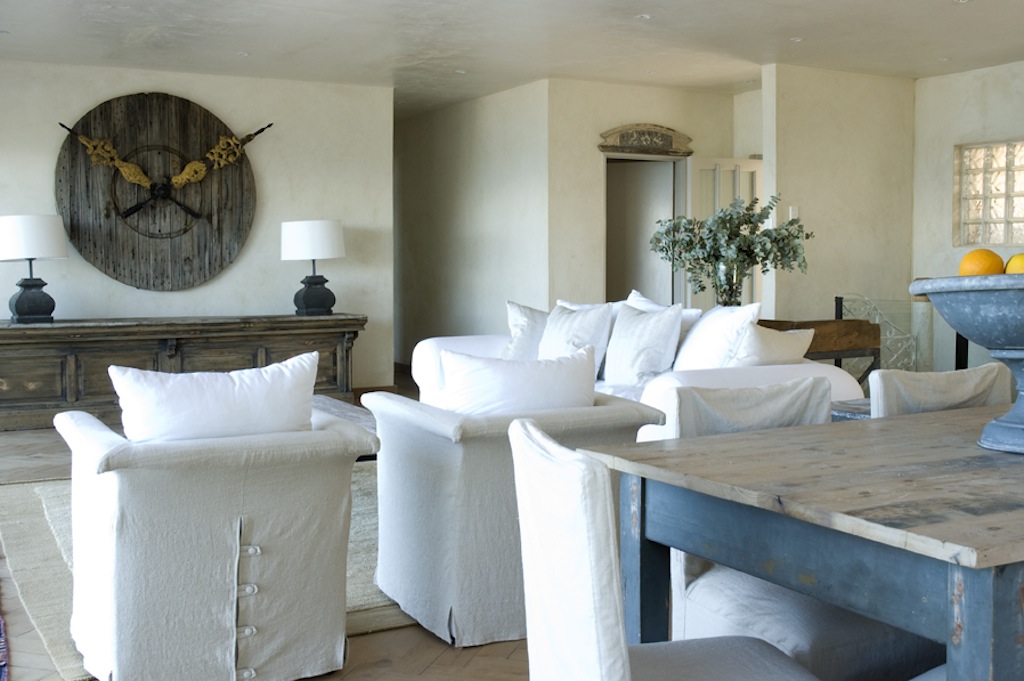 Lounge interior with bespoke furniture and antique décor by Artefect Antiques & Interiors showcasing their luxury interior design services