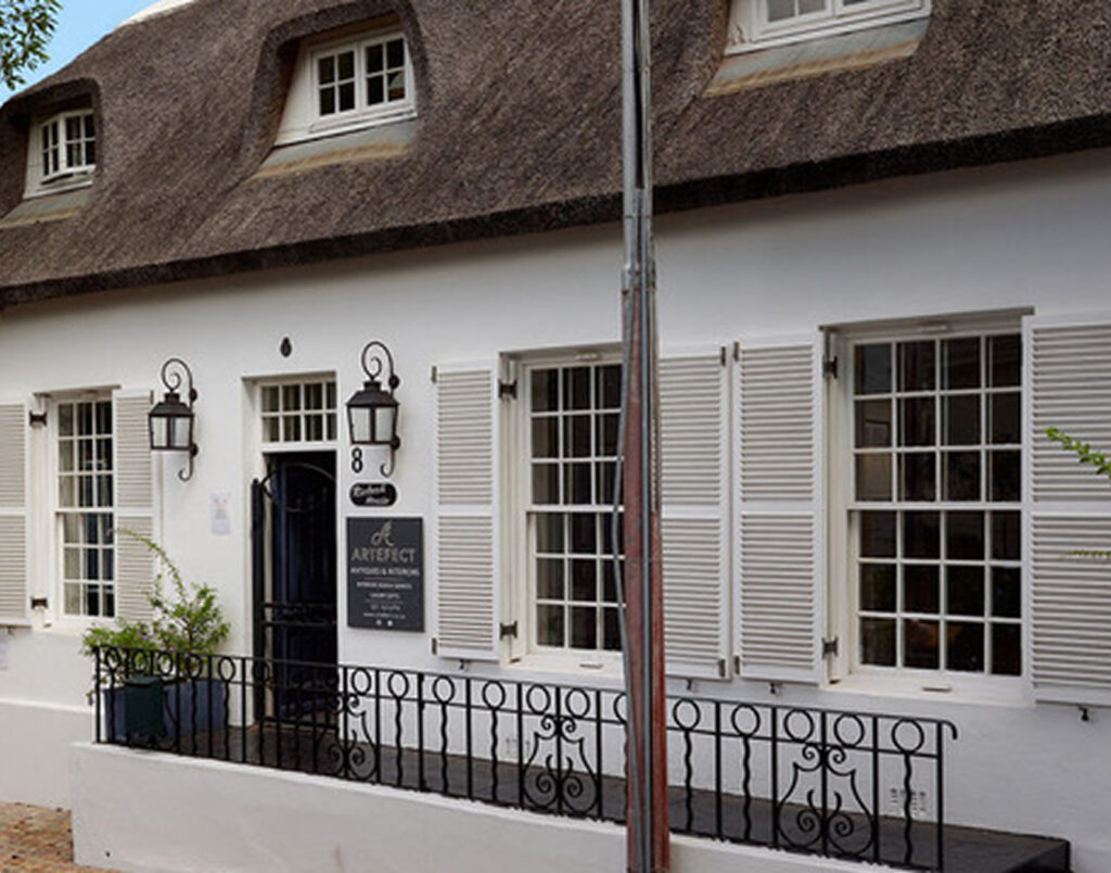 Exterior of Artefect Antiques & Interiors store in Cape Town showcasing high-end antiques and bespoke furniture