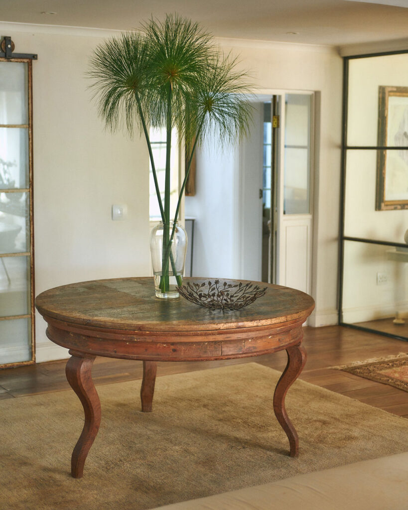 Lounge interior with bespoke furniture and antique décor by Artefect Antiques & Interiors showcasing their luxury interior design services