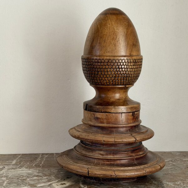 Wood finial on wood plinth